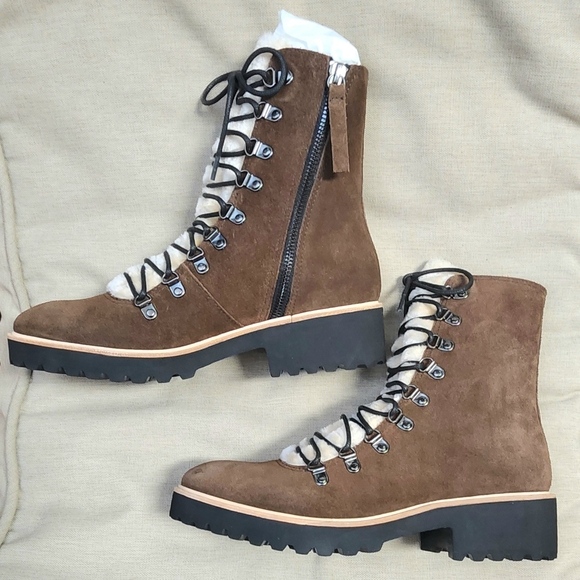 Anthropologie Shoes - **NEW** ANTHROPOLOGY ALL BLACK LACED UP SHERPA BOOTS 8.5